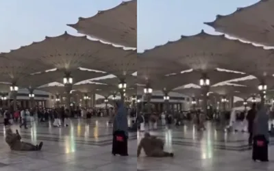 Husband lays on floor at Masjid e Nabwi to take wife’s perfect photo goes viral