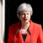 Former British leader Theresa announces to resign from parliament before year's end