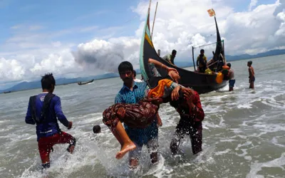 Indonesian rescuers race to save Rohingya refugees from capsized boat