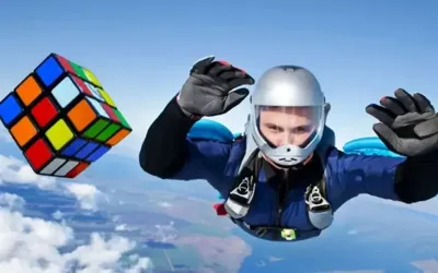 Man solves two Rubik's cubes while skydiving to break world record