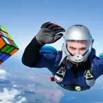 Man solves two Rubik's cubes while skydiving to break world record