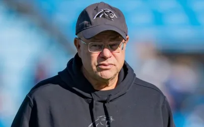 NFL slams Panthers owner with hefty fine for fan beverage toss