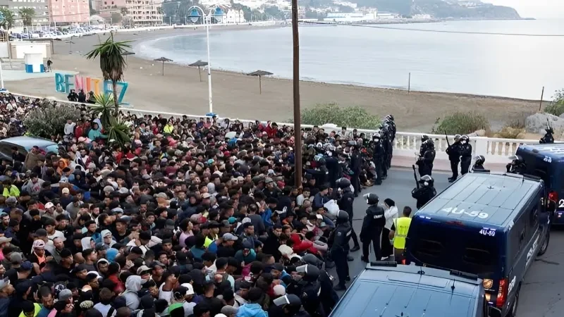 Spain launches Ceuta beach sweep as police confront migrants