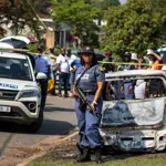 South Africa police hunt gunmen after 27 killed in tavern shootings