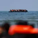 Three dead, including child, in overcrowded English Channel boat crossing from France to Britain