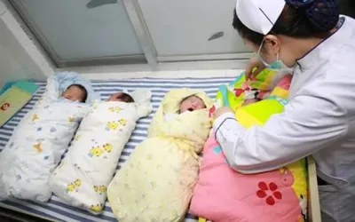Global birth rates fall as rising costs delay parenthood