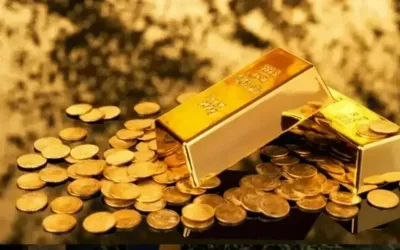 Gold prices climb in international and domestic markets