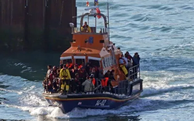 UK experiences record channel migrant arrivals in 2024, as regular immigration falls