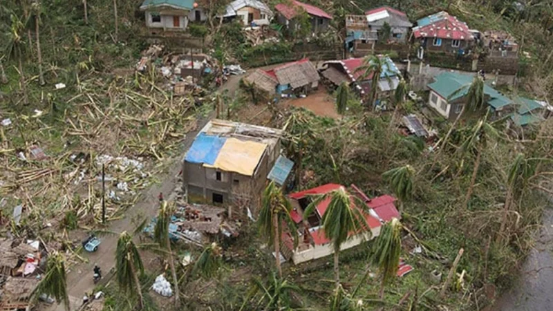 Philippines cleans up as typhoon death toll rises