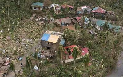 Philippines cleans up as typhoon death toll rises