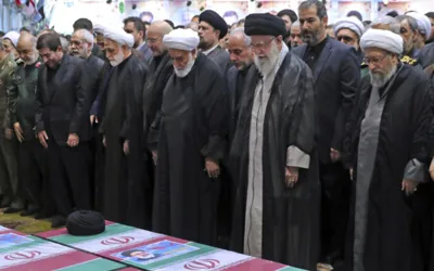 Supreme leader of Iran leads prayers at Raisi's funeral procession