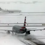Over 8,000 flights cancelled as winter storm bears down across US