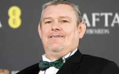American actor John Davidson faces criticism at BAFTAs