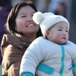 China announces five-year plan to support families, boost births